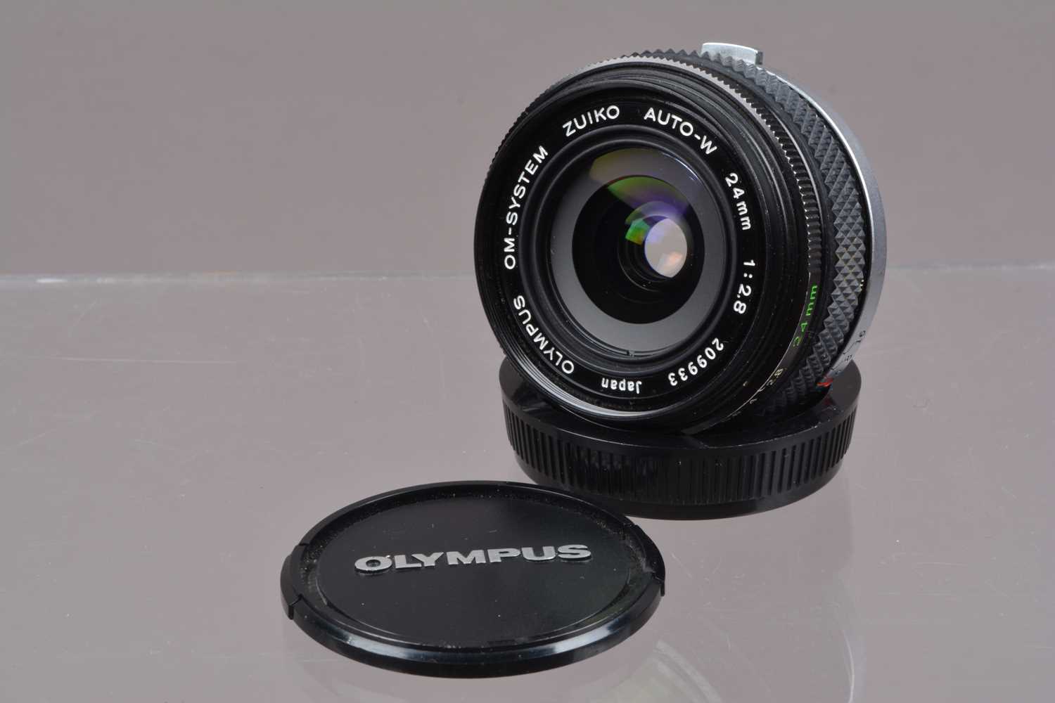 An Olympus Zuiko 24mm f/2.8 OM Lens,