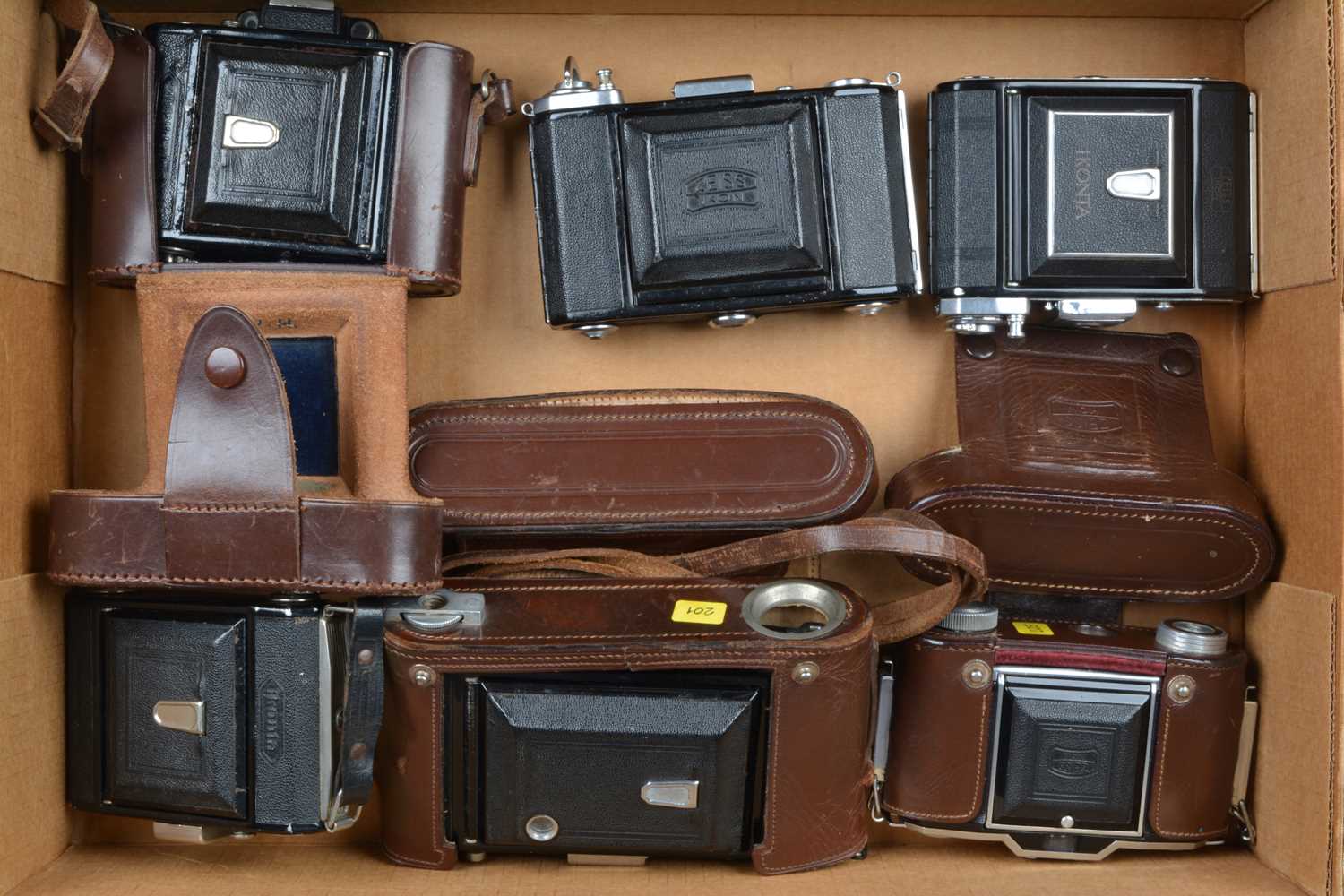 A Group of Zeiss Ikon Folding Cameras,