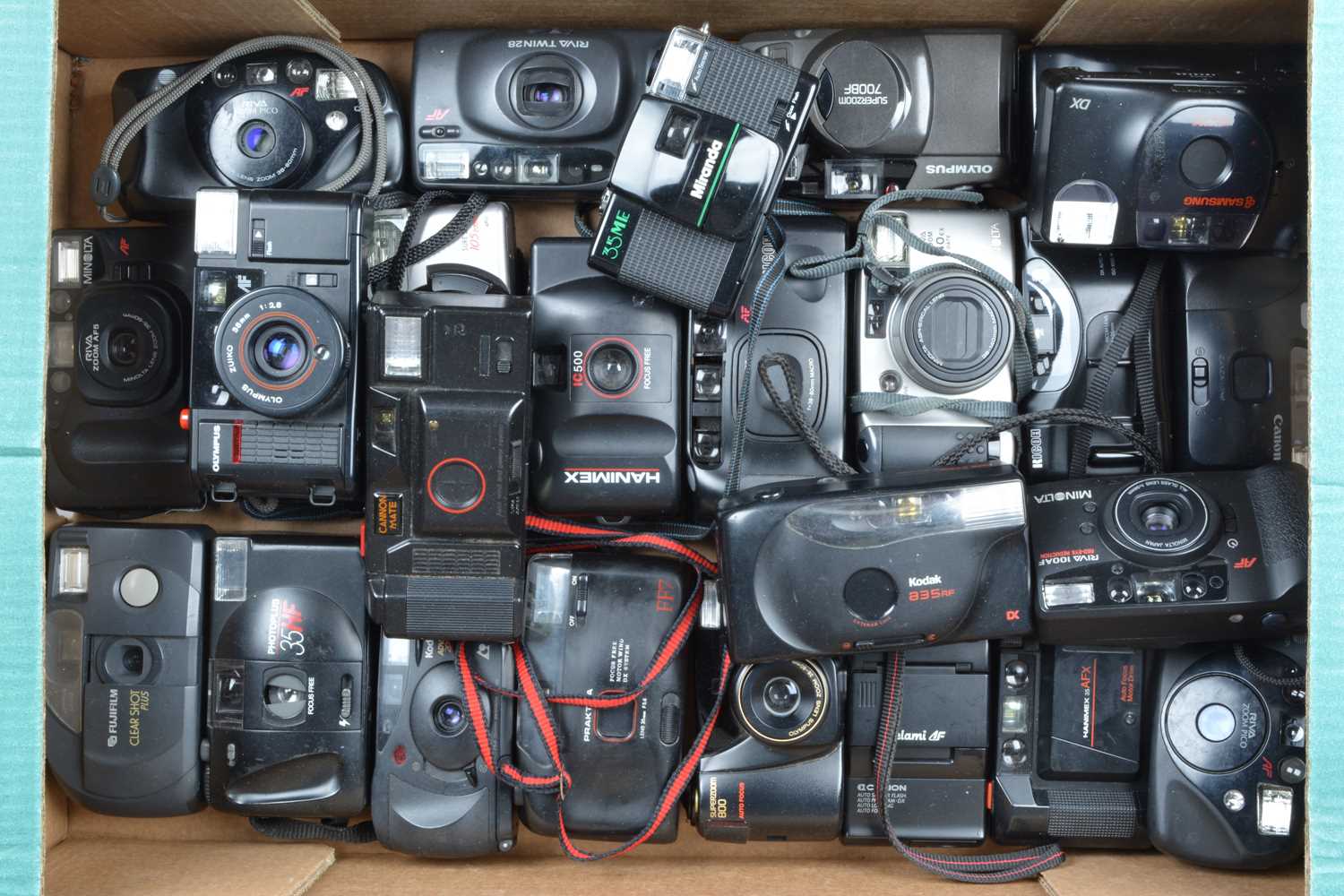 A Tray of Compact Cameras,