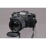 An Olympus OM 2000 SLR Camera,