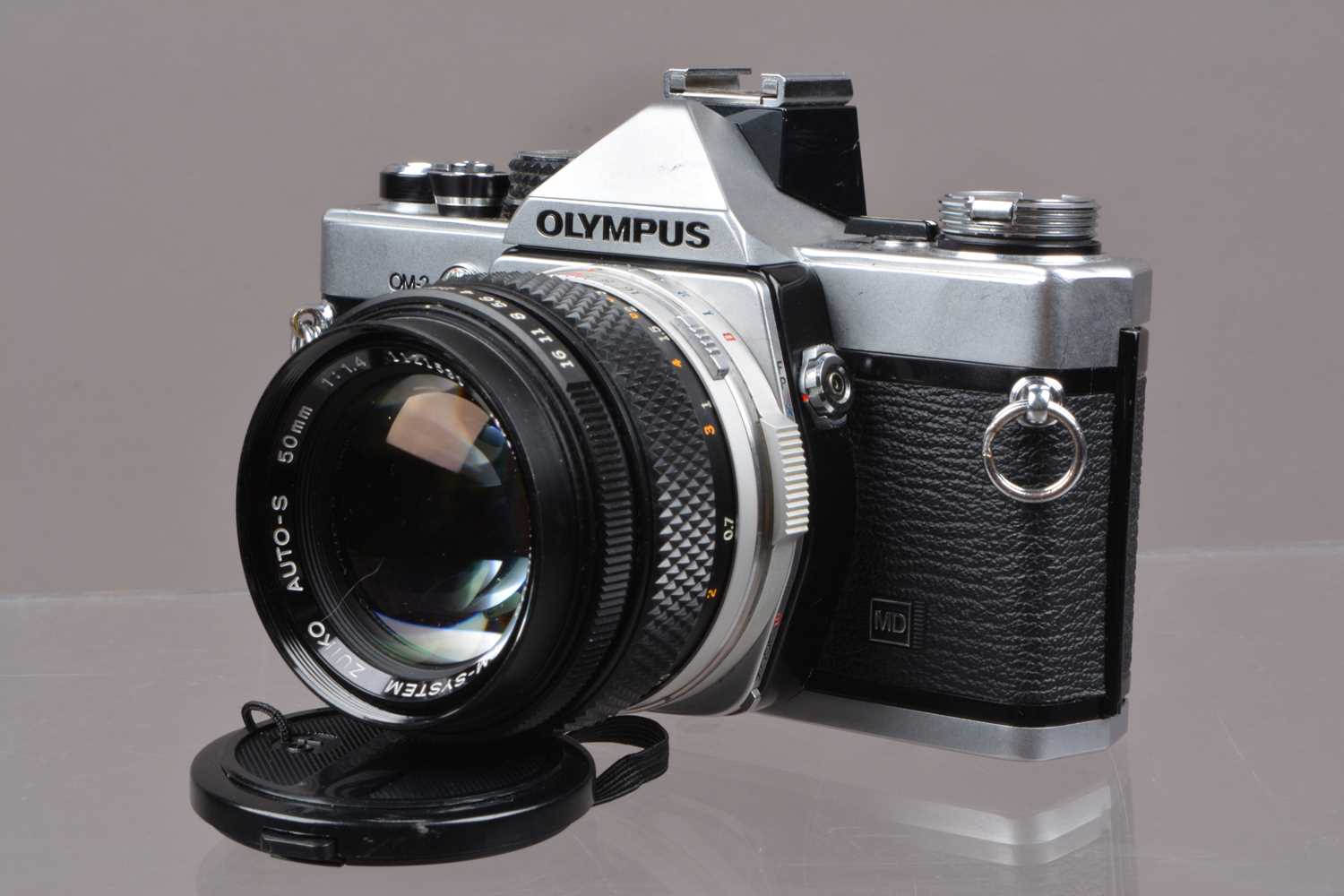 An Olympus OM-2n MD SLR Camera,