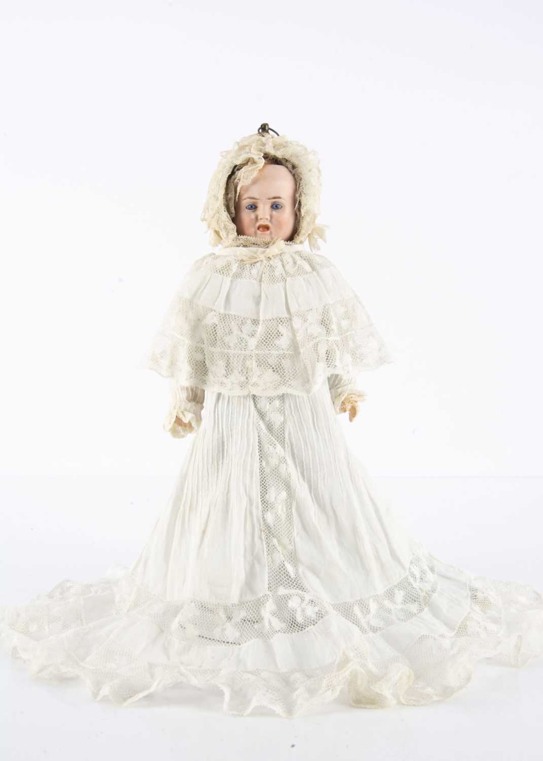 A rare Carl Bergner three-faced bisque headed doll,