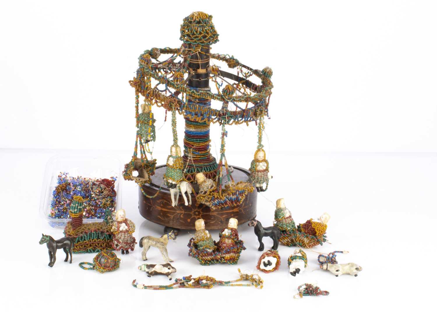 An unusual 19th century beadwork musical carousel,