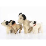 Four British soft toy Caesar dogs,
