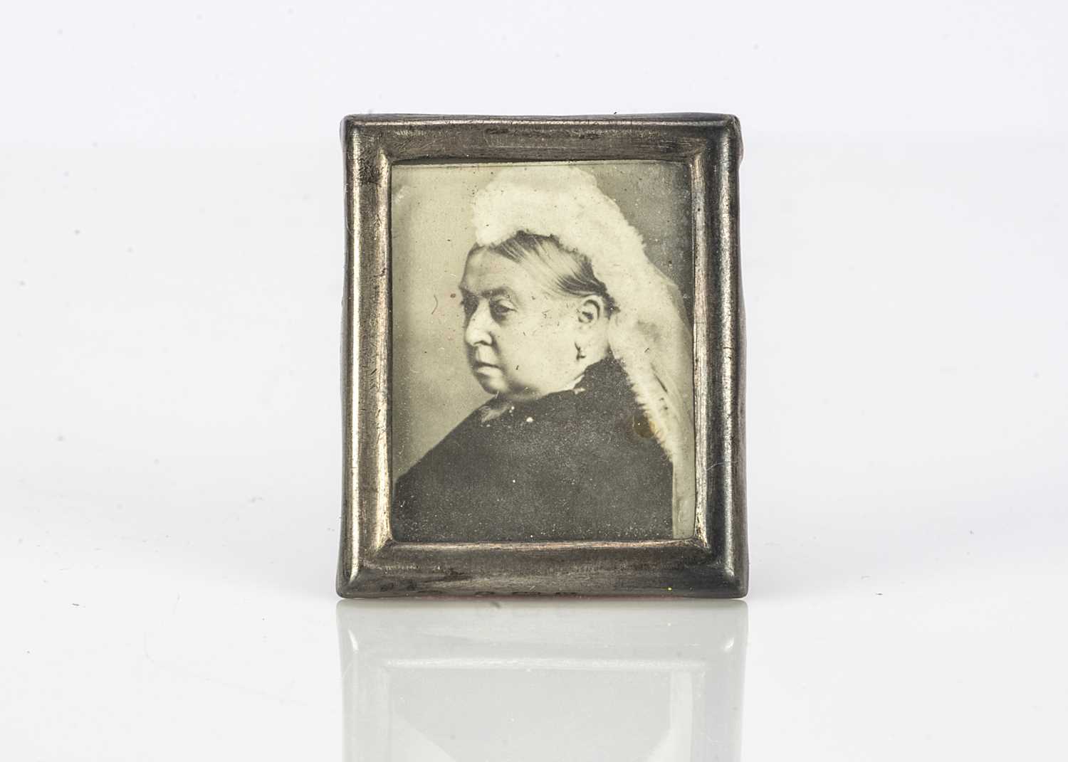 A rare Queen Mary’s Dolls’ House Birmingham hallmarked silver framed photograph of Queen Victoria,