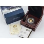 A Royal Mint Elizabeth II quarter ounce gold proof Britannia coin,