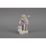 A damaged 19th century Meissen porcelain figure of a cherub,