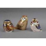 Three Royal Crown Derby bone china owl paperweights,