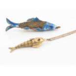 A silver gilt and enamel fish pendant,