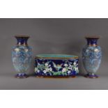 A pair of Royal Doulton stoneware vases, blue ground with floral design and heightened gilt work, im