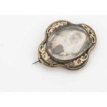 A 19th century Daguerreotype and pinchbeck brooch,