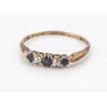 A five stone diamond and sapphire dress ring,