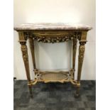 An early 20th century continental gilt wood and marble topped occasional table,