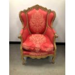 A 20th century Louis XV style continental armchair,