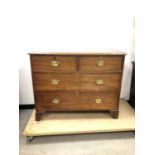 A damaged Edwardian mahogany chest of drawers,