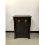 A 19th century and later converted oak cupboard,