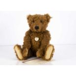 A Steiff limited edition replica 1905 red brown teddy bear,