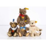 Four small Steiff yellow tag teddy bears,