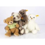 Four Steiff yellow tag teddy bears,