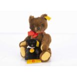 Two small Steiff yellow tag teddy bears,