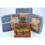 Four post-war Hornby 0 Gauge Set Boxes and assorted Contents (qty),