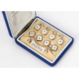 A 9ct gold and mother of pearl gentleman's dress stud set,