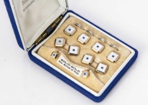 A 9ct gold and mother of pearl gentleman's dress stud set,