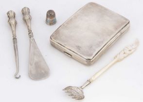An Art Deco period silver cigarette case and other items,