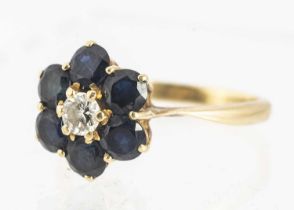 An 18ct gold diamond and sapphire cluster dress ring,