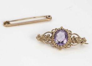 An amethyst and 9ct gold brooch,