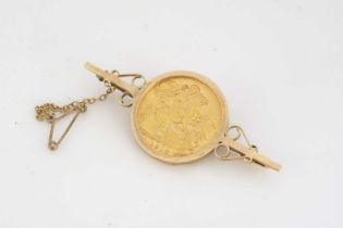 A George V full sovereign bar brooch,