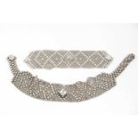 A contemporary chrome plated American chocker necklace and matching bracelet,