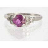 An Art Deco platinum diamond and synthetic ruby dress ring,