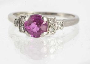 An Art Deco platinum diamond and synthetic ruby dress ring,