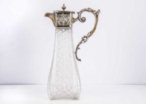 A late Victorian cut glass and silver mounted claret jug from TR & Co,