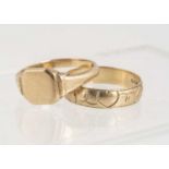 A 9ct gold engraved heart shaped designed band,