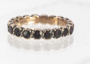 A 19 century garnet full eternity ring,