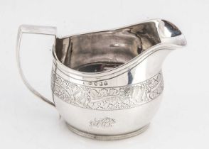 A George III silver milk jug,