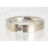 An 18ct white gold diamond tenson ring,