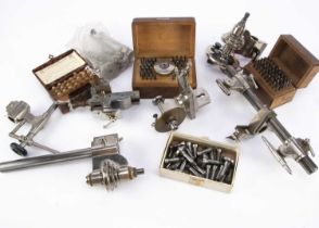 A group of watch repairers and lathe items,