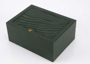 An empty Rolex wristwatch box,