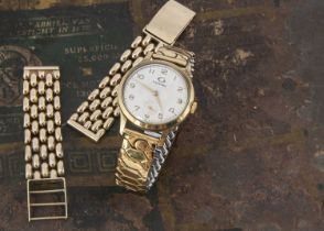 A 1960s 9ct gold cased Garrard presentation wristwatch and a 9ct gold watch strap,
