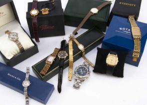 A small group of boxed and unboxed fashion watches,