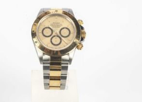 A 1990s Rolex Oyster Perpetual Daytona stainless steel and 18ct gold wristwatch full set,