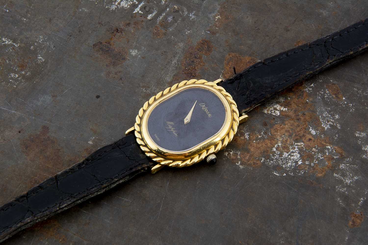 A c1980s DeLaneau 18ct gold cased manual wind lady's wristwatch,