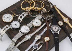 A group of modern and vintage mechanical wind watches,