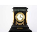 An American late 19th century or early 20th century slate mantle clock,