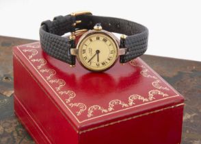 A modern Must De Cartier silver gilt quartz wristwatch,