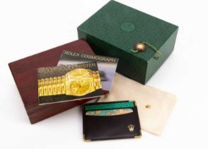 An empty 1990s Rolex watch box,