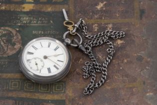 A Victorian silver open faced pocket watch with chain